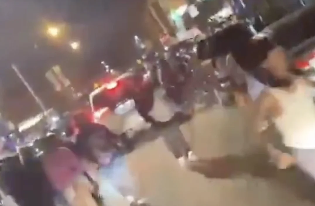 Hundreds of teens stream across downtown Naperville during the March 30 “teen takeover,” overwhelming streets and prompting arrests, citations, and a large police response.