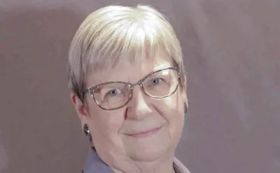 Former Downers Grove Library Trustee Marti Sladek resigned quietly in July after making a sexually explicit joke about a 15-year-old boy whose mother had raised concerns over LGBTQ+ content in the library.
