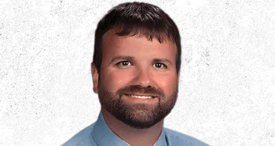 Travis Portz, Superintendent