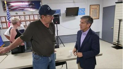 Ted Dabrowski, Gubernatorial Candidate for Illinois pictured with Dan Cole, a farmer from the Quincy area