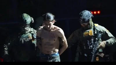 Illegal alien being arrested during the federal “Operation Midway Blitz” in the Chicago area