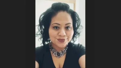 Cristina Monroy, a Grass Lake School staffer, faces backlash after posting she had “no empathy” for assassinated activist Charlie Kirk. Parents are calling for her removal.