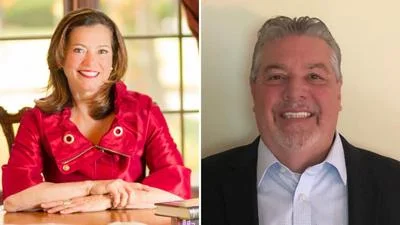 River Forest Village President Cathy Adduci, left, and Christopher Swieca, senior vice president, Wintrust