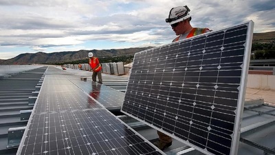 Medium solar panels installation workers array power sun electricity energy supply