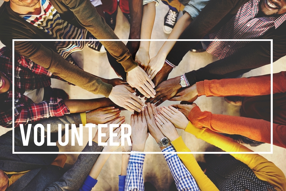 Shutterstock volunteer hands group circle