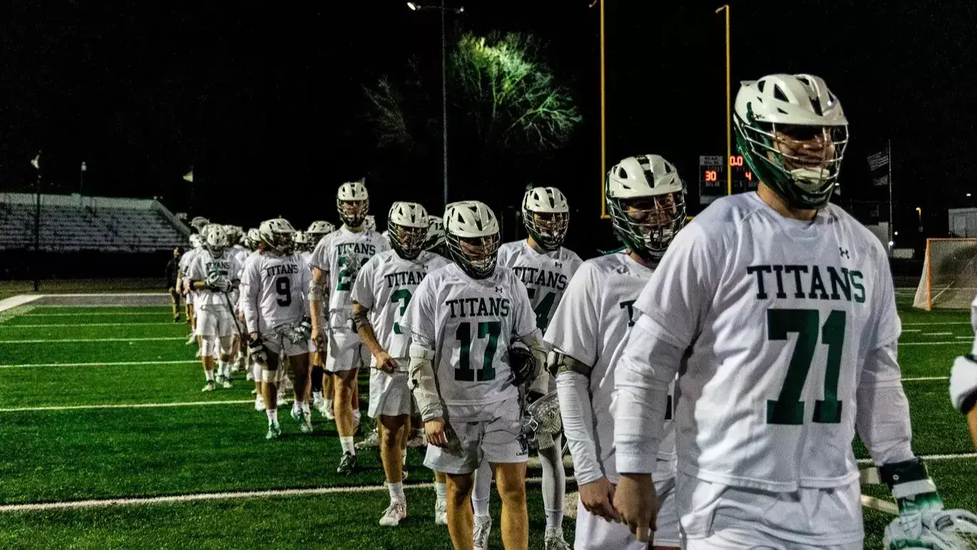 Illinois Wesleyan wins tight match over Carthage, remains unbeaten in conference