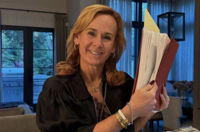 DuPage County Board Member Kari Galassi, a Republican, is drawing criticism after walking out before a vote condemning ICE actions. The resolution passed 12–1, with Democrats in favor and one GOP dissent.